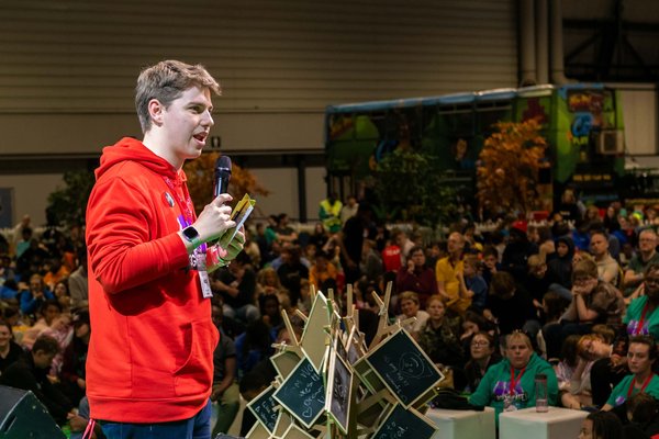 Tom Hart on stage at 3Gen 2023.jpg